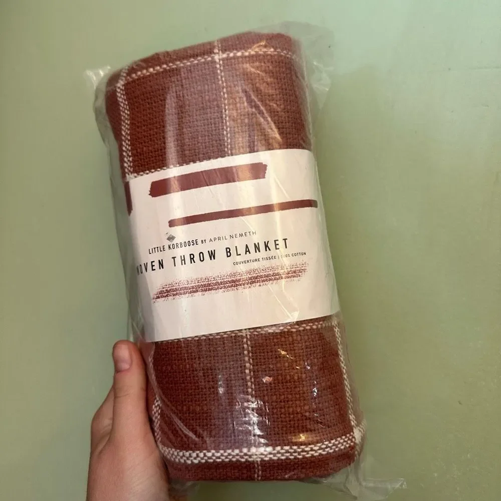 Little Korboose by April Nemeth rust woven throw blanket
